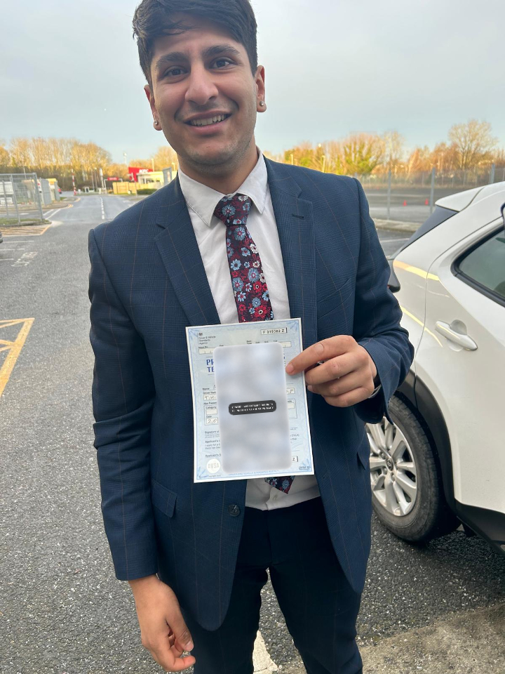Passed learner holding a privacy-protected practical driving test certificate